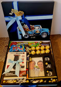 Caja regalo azul marino DAD con chocolates Ferrero Rocher, rasuradora, dulces y portarretrato para papá