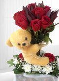 Red roses and yellow teddy bear floral arrangement